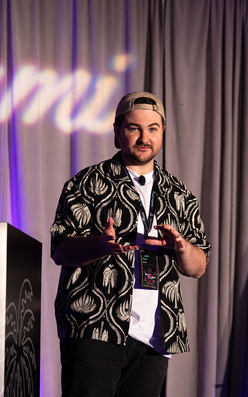 Braydon speaking at React Miami 2026.